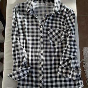 A black and white plaid button down